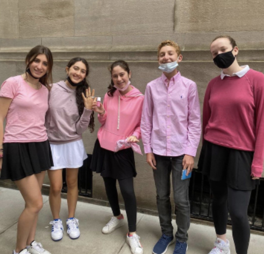 Ramaz students showing their support for Breast Cancer Awareness on Pink Day.