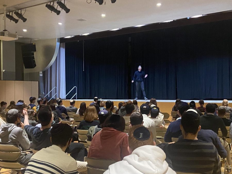 Caleb Rosenfeld 22 performing in the Shakespeare Competition.