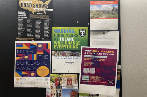 A bulletin board outside the College Office on the C level displays flyers for different colleges.