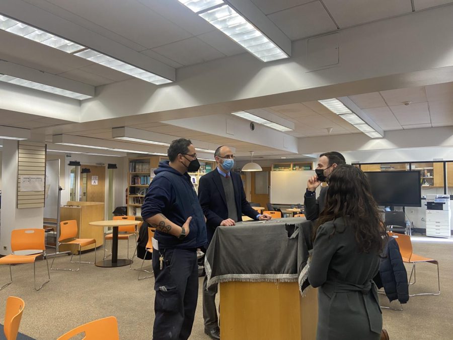 Dr. Stein Kokin, Ms. Krupka and other faculty and staff discuss the library’s layout.