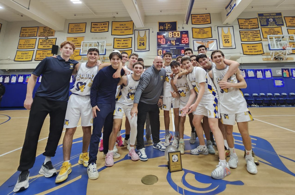 Varsity basketball team after winning the Sam Gyenes Memorial Tournament